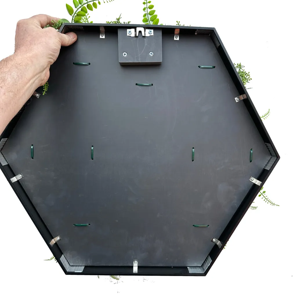Artificial mixed green foliage with ferns in a hexagon frame